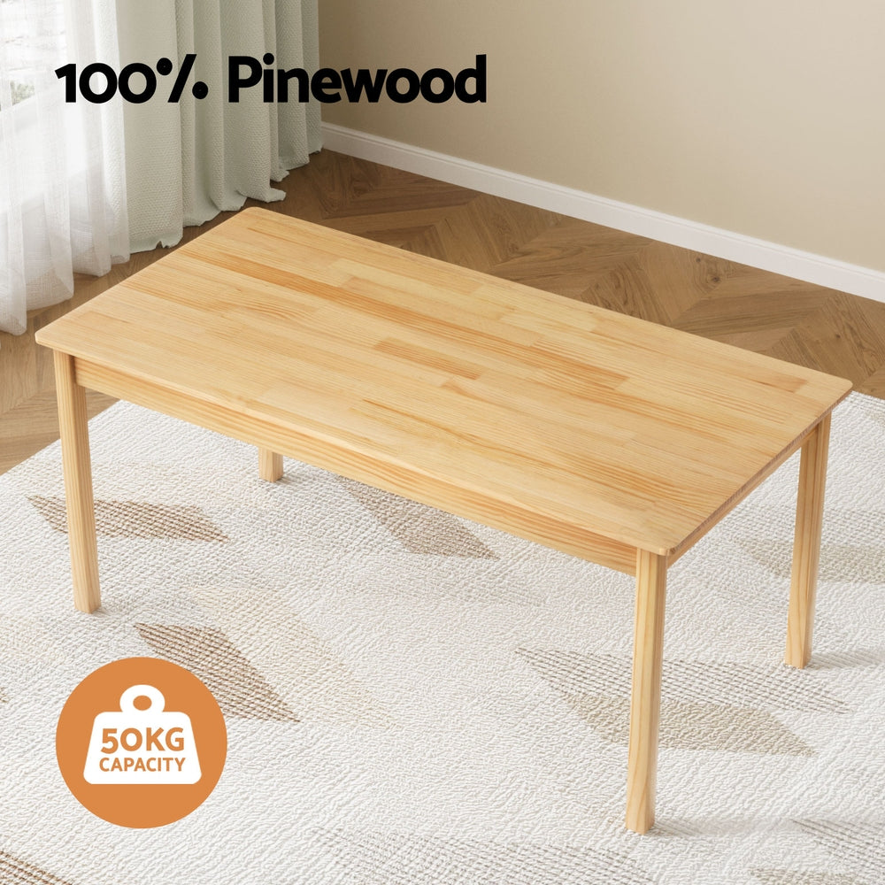 Wooden table with '100% Pinewood' and '50KG CAPACITY' label on a neutral background