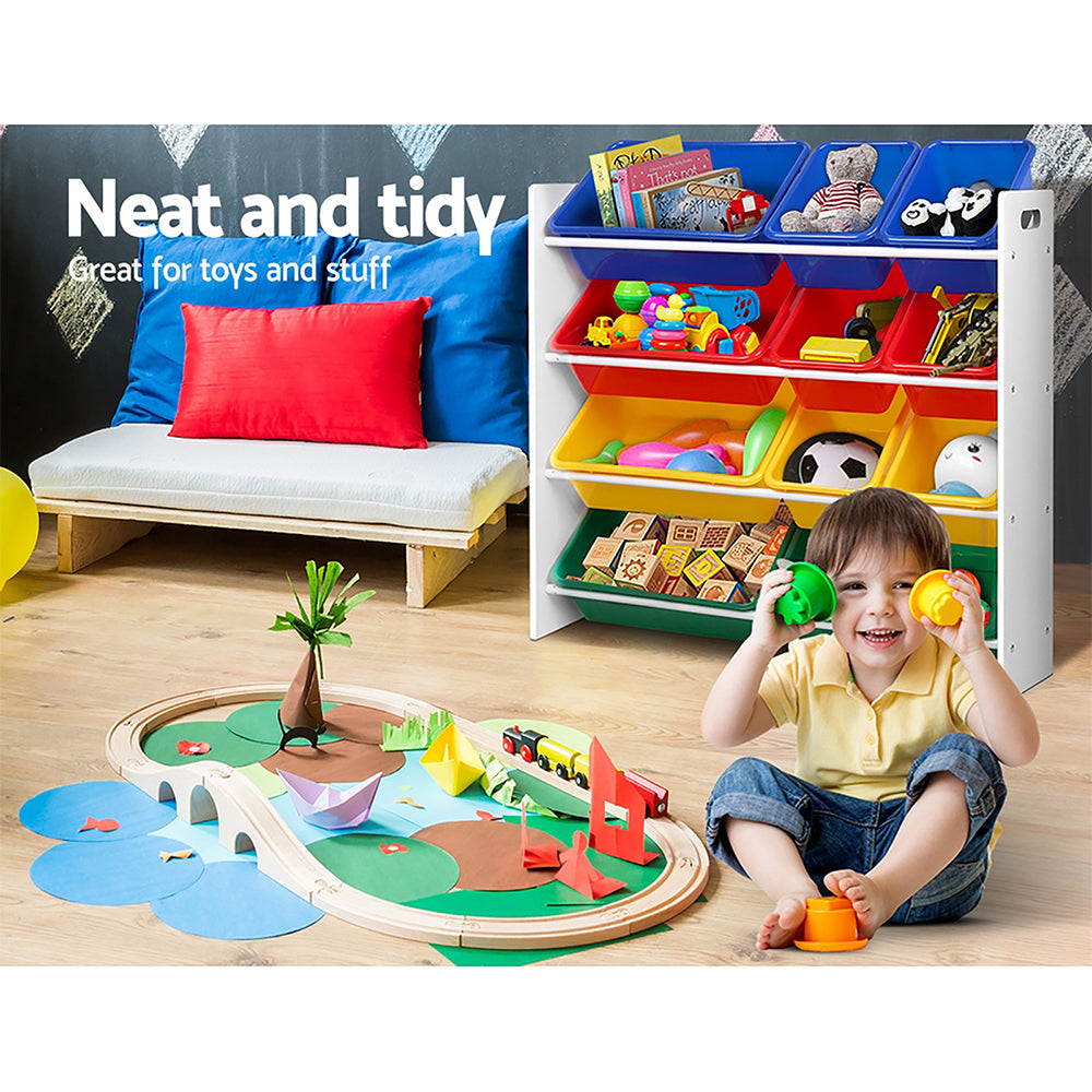 Child playing with toys in a colorful toy storage unit labeled 'Neat and tidy'.