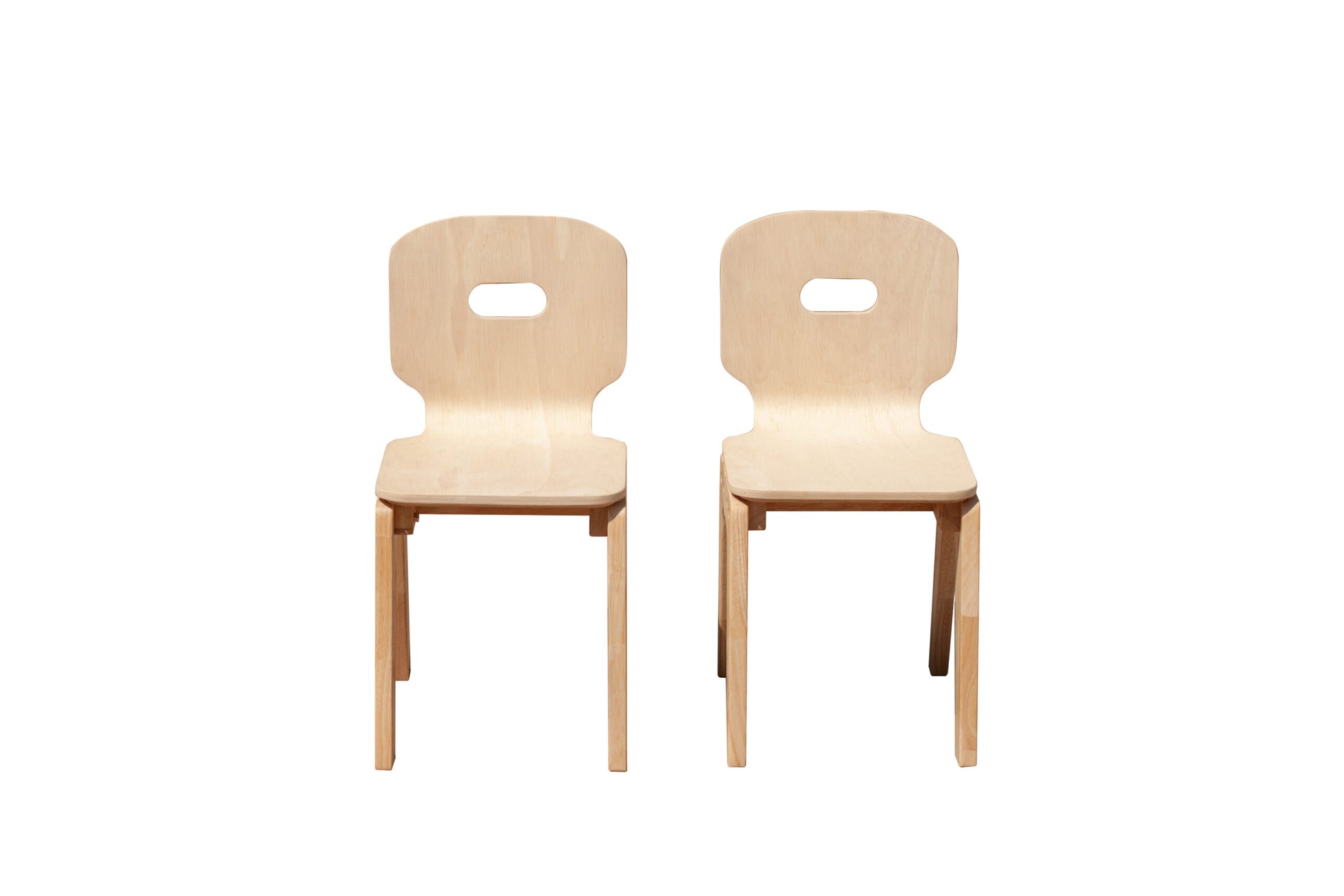 Two wooden chairs on a white background