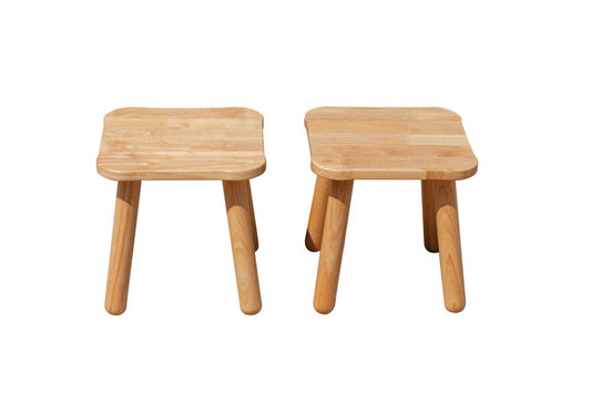 Two wooden stools on a white background